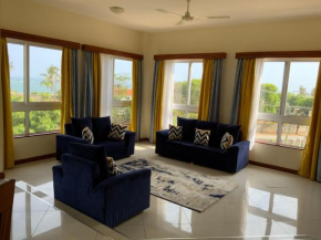 Nena's Haven- Nyali, 1st Avenue- 4-Bedroom Seaview Apartment with pool & High speed Internet